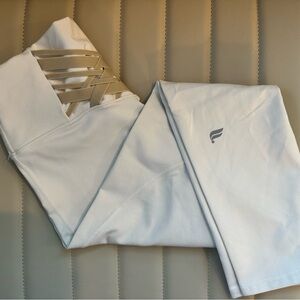 Fabletics Powerhold. White with tan accent on the back. Size small 7/8 length.